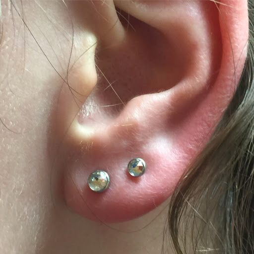 Explore women's quarter sleeve tattoo ideas, creative tattoo ideas in San Diego, available at Body Art Salon