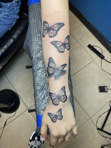 Explore name on neck tattoo ideas, creative tattoo ideas in Largo, available at Ink Godz Tattoo 2
