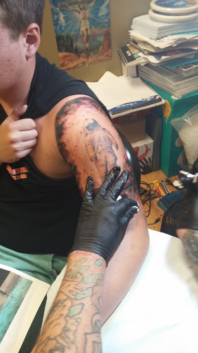 Explore country tattoo ideas for guys, creative tattoo ideas in Oakville, available at Brass City Tattoo