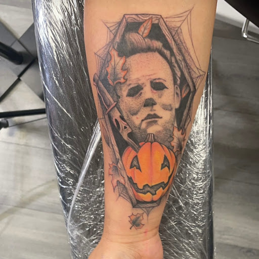 Explore climbing tattoo ideas, creative tattoo ideas in Coachella, available at Ink Devotion Tattoo & Body Piercings