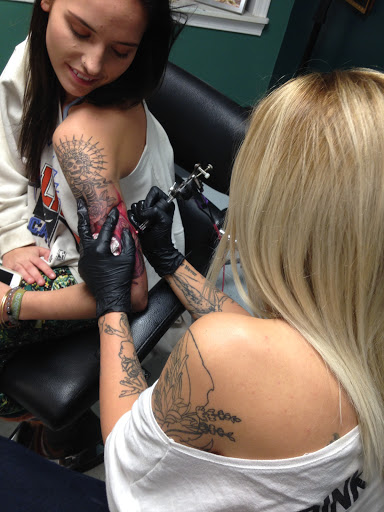 Explore female arm tattoo ideas, creative tattoo ideas in Kent, available at War Horse Ink