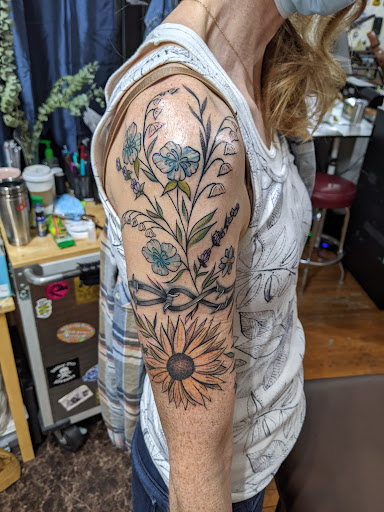 Explore wife name tattoo ideas, creative tattoo ideas in Fargo, available at No Coast Tattoo