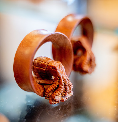 Explore tribal head tattoo ideas, creative tattoo ideas in Summerville, available at Exotic Impressions Body Piercing