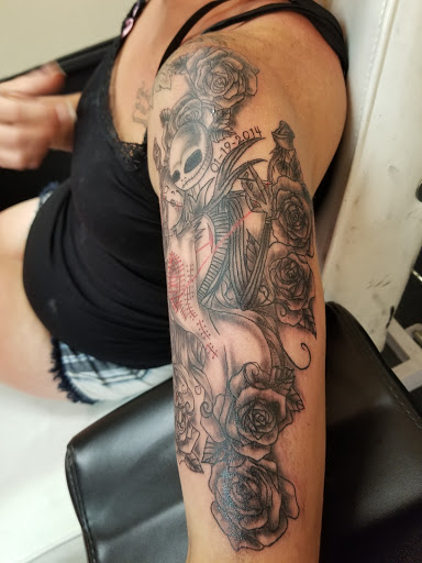 Find tiger tattoo ideas for your next unique tattoo in Onalaska at Divine Designs tattoo studio