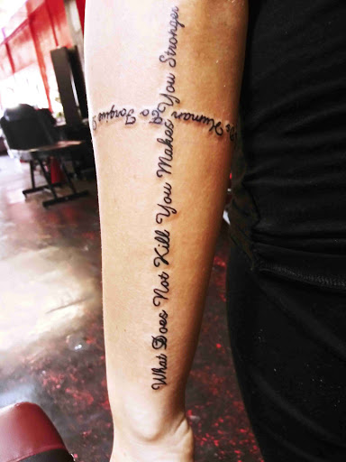 Explore wrist cross tattoo ideas, creative tattoo ideas in Daytona Beach, available at Studio 21 Tattoo & Piercings Daytona Beach