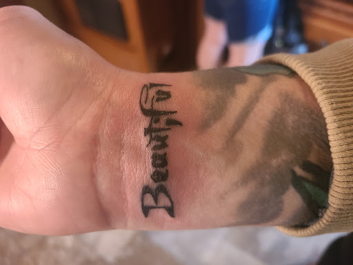 Explore leg flower tattoo ideas, creative tattoo ideas in Pahrump, available at Social Suicide Tattoos