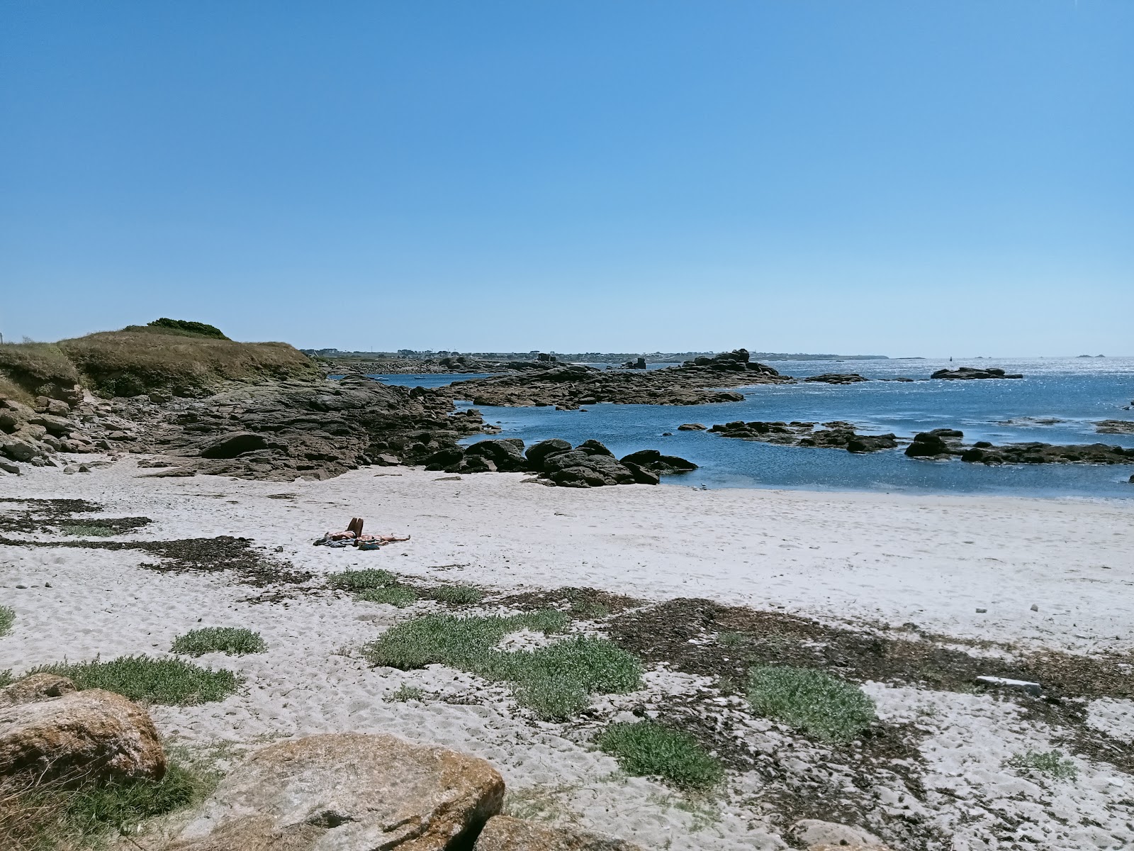 Foto di Plage de Melon con una superficie del sabbia beige