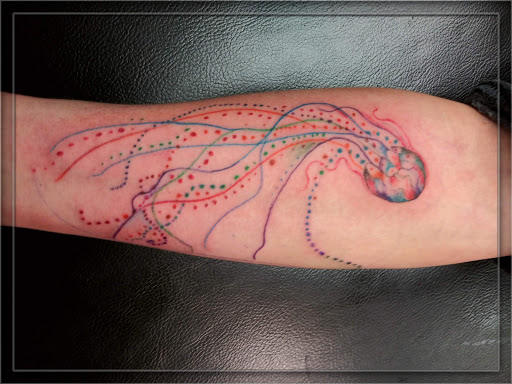 Explore umbrella tattoo ideas, creative tattoo ideas in La Crosse, available at La Crosse Tattoo