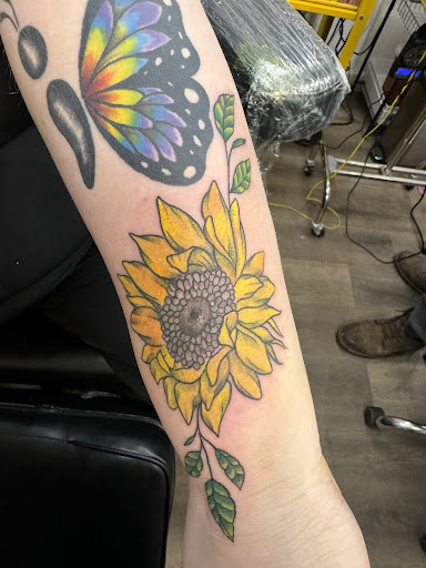 Explore cute cross tattoo ideas, creative tattoo ideas in Evart, available at Templar Tattoo