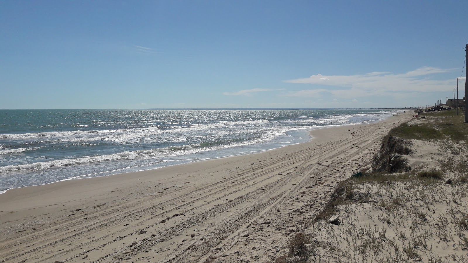 Valokuva Gado Bravon rantaista. pinnalla turkoosi puhdas vesi:n kanssa