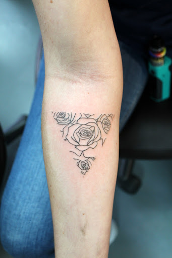 Explore 90s tattoo ideas, creative tattoo ideas in Fort Myers, available at Tiger Lotus Tattoo and Piercing