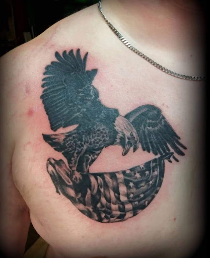 Explore new years tattoo ideas, creative tattoo ideas in Decatur, available at Exclusive Ink Tattoos & Body Piercings 22nd & Wood
