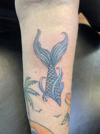 Explore american traditional elbow tattoo ideas, creative tattoo ideas in Cocoa, available at Rorschach Tattoo Shop and Piercing Studio