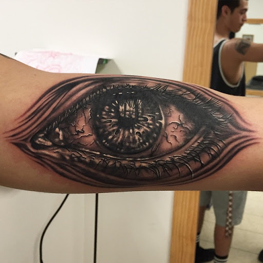 Explore forearm tattoo filler ideas, creative tattoo ideas in Oviedo, available at Homesick Tattoo Studio & Gallery