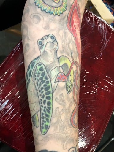 Tattoo Shop «Nine Lives Tattoo», reviews and photos, 61 N Holladay Dr, Seaside, OR 97138, USA