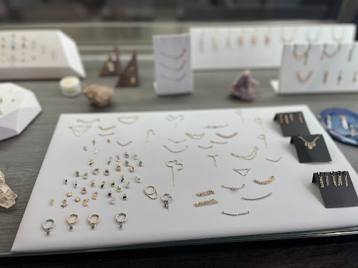 Explore carnation tattoo ideas, creative tattoo ideas in Minneapolis, available at Sacred Siren Tattoo & Art Parlor