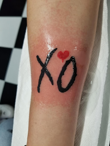 Explore traditional hand tattoo ideas, creative tattoo ideas in Corpus Christi, available at Purple Ink - Tattoo & Piercing Studio