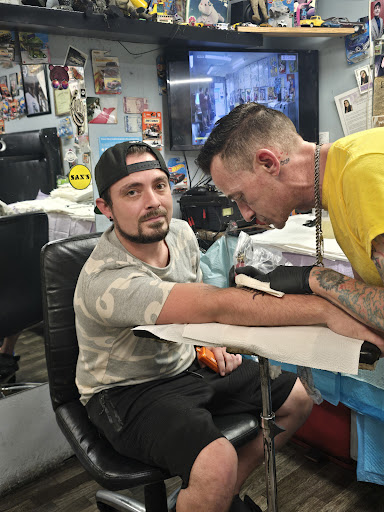 Explore tattoo cover up ideas for guys, creative tattoo ideas in Cranston, available at Kabloom Tattoo Studio