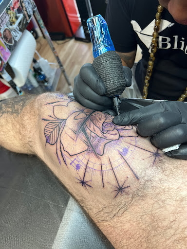 Find in between breast tattoo ideas for your next unique tattoo in Arlington at Urbans Tattoo & Piercing Studio