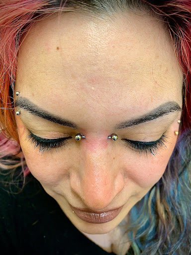 Explore howdy tattoo ideas, creative tattoo ideas in Orange, available at Symbiosis Body Piercing