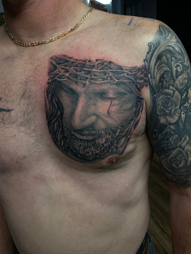 Explore mural tattoo ideas, creative tattoo ideas in Scranton, available at The Rock Shop Tattoo Gallery
