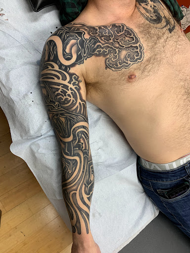 Explore alchemy tattoo ideas, creative tattoo ideas in Kansas City, available at Crimson Tattoo