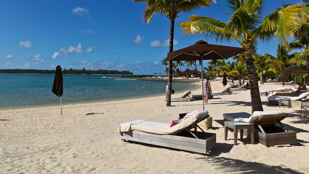 Fotografie cu Four Seasons Mauritius cu o suprafață de nisip alb