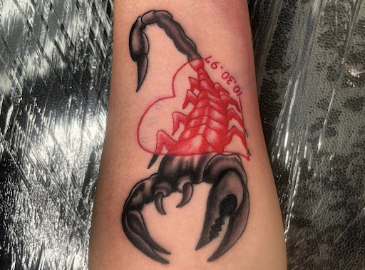 Explore barbed wire tattoo cover up ideas, creative tattoo ideas in Little Rock, available at Arkansas School of Tattoos and Piercings