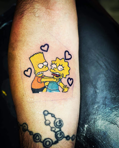 Explore rainbow baby tattoo ideas, creative tattoo ideas in Easley, available at Peach Pit Tattoo