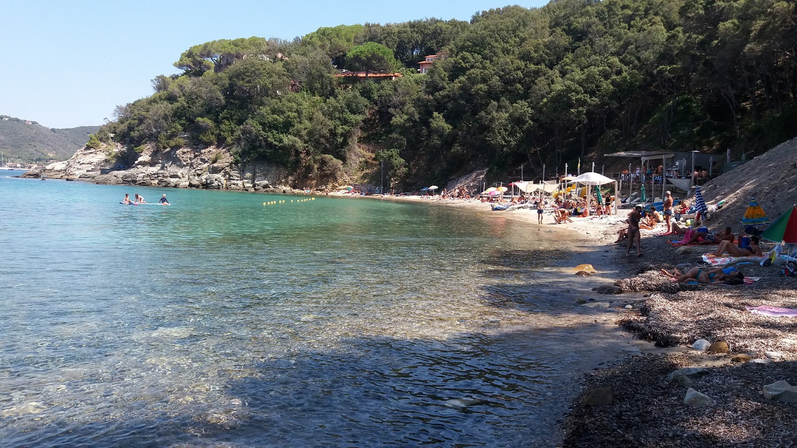 Photo of Spiaggia della Paolina surrounded by mountains