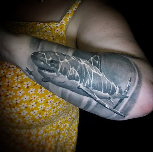 Explore hands tattoo ideas, creative tattoo ideas in Stockbridge, available at Black Rose Tattoo Collective