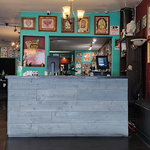 Explore cover up ideas for ankle tattoos, creative tattoo ideas in San Diego, available at Sideshow Tattoo and Piercing