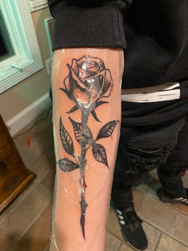 Explore tattoo word ideas for men, creative tattoo ideas in Johnson City, available at Gold Cross Tattoo Co.