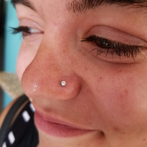 Explore unalome tattoo ideas, creative tattoo ideas in Kearney, available at Studio 5150 Piercing & Fine Jewelry