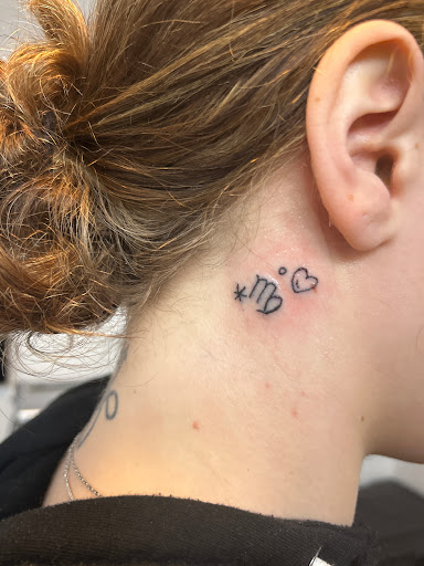 Explore orchid tattoo ideas, creative tattoo ideas in Mattapan, available at Famous Touch Tattoos