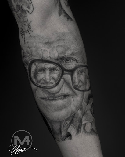 Explore catholic tattoo ideas for guys, creative tattoo ideas in Greenwood, available at Vault 74 Tattoo, LLC
