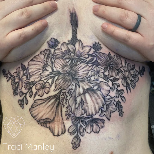 Explore men's rib tattoo ideas, creative tattoo ideas in Spokane, available at Moms Custom Tattoo & Body Piercing