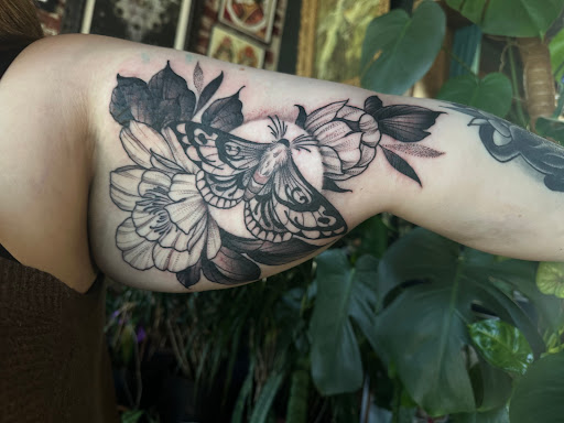 Explore birthday tattoo ideas for guys, creative tattoo ideas in Paducah, available at Third Moon Tattoos