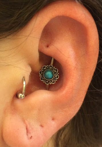 Explore pink ribbon tattoo ideas, creative tattoo ideas in Fort Walton Beach, available at Piercings by Torrie
