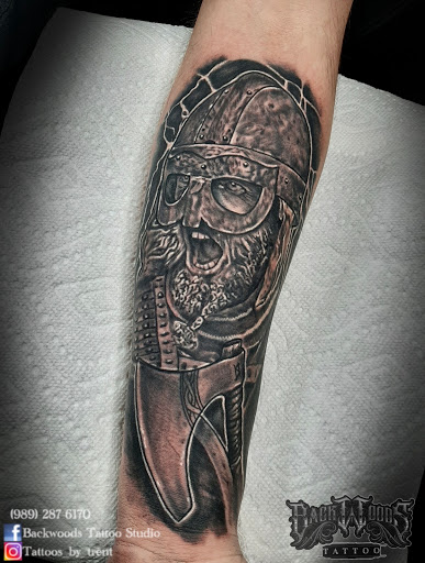 Explore uplifting tattoo ideas, creative tattoo ideas in Lakeview, available at Backwoods Tattoo Studio