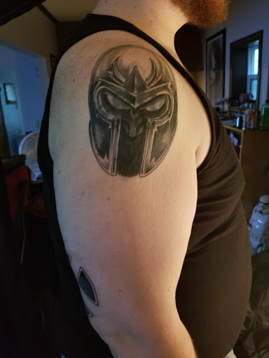 Explore amity affliction tattoo ideas, creative tattoo ideas in Bradford, available at Alley Ink Tattoos & Body Services