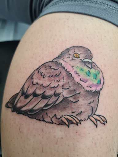 Explore unique side thigh tattoo ideas, creative tattoo ideas in Cincinnati, available at Flying Tiger Tattoo