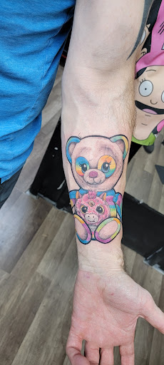 Explore annabelle tattoo ideas, creative tattoo ideas in Largo, available at Alchemy Tattoos and Body Piercings