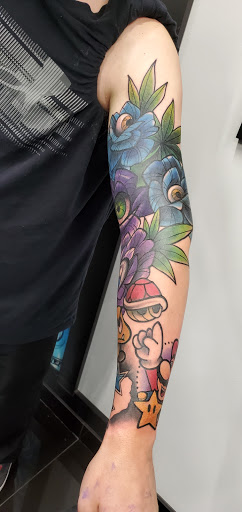 Explore religious sleeve tattoo ideas, creative tattoo ideas in Addison, available at Cat Tattoo