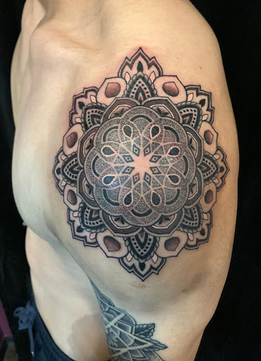 Explore climbing tattoo ideas, creative tattoo ideas in San Diego, available at Remington Tattoo Parlor