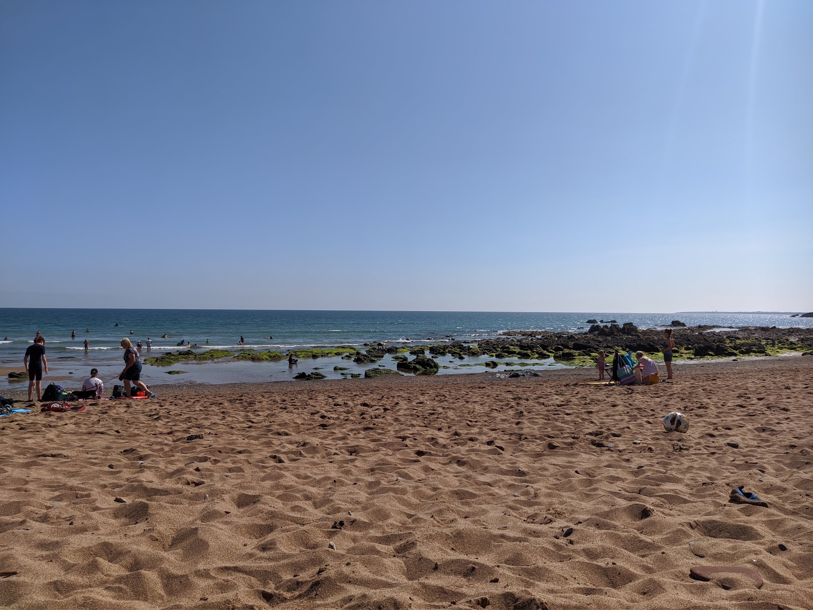 Fotografija Carnivan Bay Beach in naselje