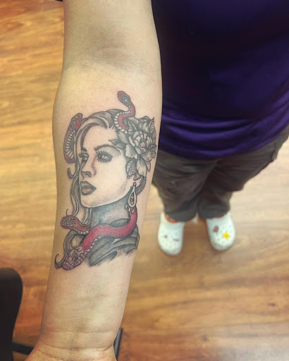 Explore small bee tattoo ideas, creative tattoo ideas in Cocoa, available at Rorschach Tattoo Shop and Piercing Studio