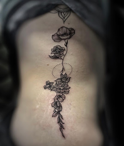 Explore side tattoo ideas for women, creative tattoo ideas in Lavonia, available at 1890 Tattoo Co.