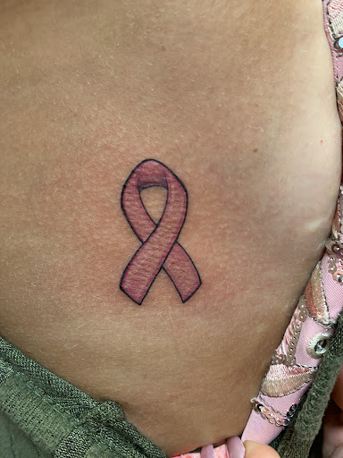 Explore mens neck tattoo ideas, creative tattoo ideas in Red Bank, available at Resilient Visions