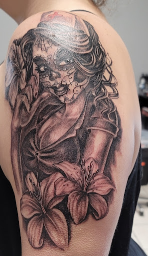 Explore minnesota tattoos ideas, creative tattoo ideas in Ocoee, available at Slaughterized Ink Tattoo and Piercing Studio